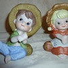 Porcelain figurines little boy and girl fishing   