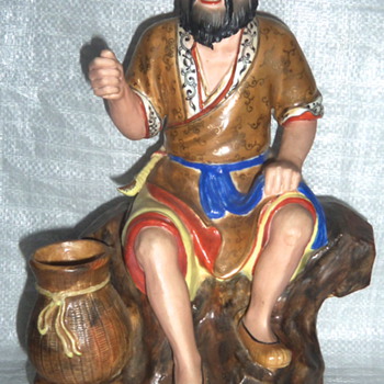 Asian porcelain pottery figure signed
