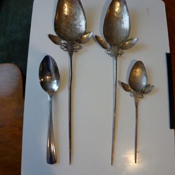 silver hand pounded and eatched graduating spoons