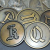 Help with these old brass letters???