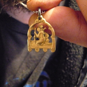 an old st christopher pendant