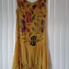 20's or 30's Flapper dress? Can anyone tell me what era and style this dress is? 