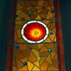 leaded multi-colored bullseye stained glass window from childhood home