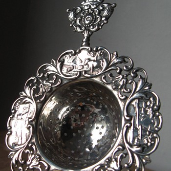Teah strainer very old. Silver with farming related images.  - Kitchen