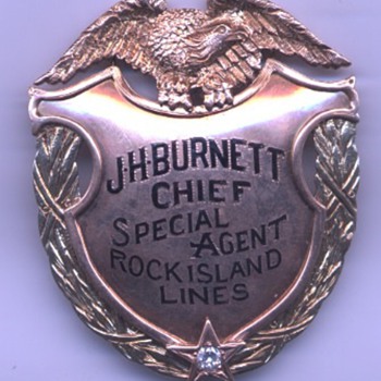 14K gold presentation badge belonging to Rock Island Railroad Chief Special Agent John H. Burnett