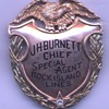 14K gold presentation badge belonging to Rock Island Railroad Chief Special Agent John H. Burnett