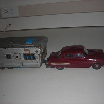 Model cars built when I was a kid & promo cars and a tin toy camper.