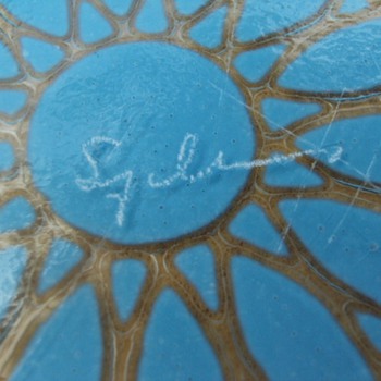 Who is the artist? I can't make out the signature.