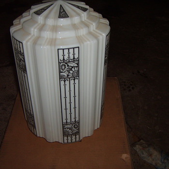 Art deco white glass skyscraper globe