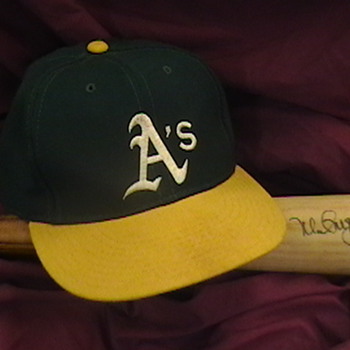 Autographed Mark McGwire 1996 Game Used Rawlings Bat and Cap