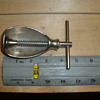 Metal "Nut" shaped nutcracker 