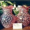 hard to find opalescent cranberry pitchers from the 1800's