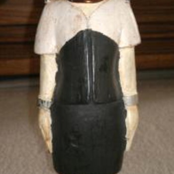 Wooden   Figure with brass ring around neck & Legs 
