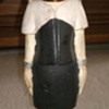 Wooden   Figure with brass ring around neck & Legs 