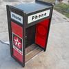 IT'S A PHONE BOOTH EMBURST WITH A TEXACO DESIGN