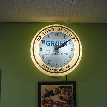 Various Dualite Advertising Clocks