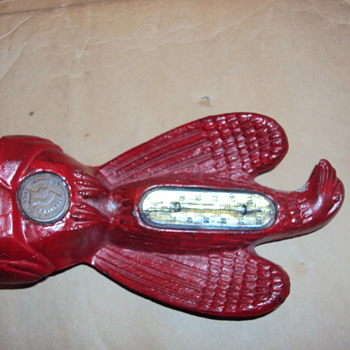 Red Cast iron eagle thermomter with inserted inian head penny