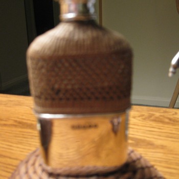 UPDATE........MYSTERY POCKET FLASK w/hallmark picture