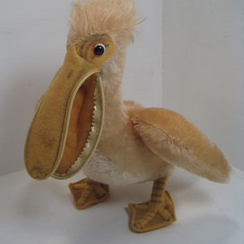 Bird's the word when it comes to this yellow Steiff fellow! - Dolls