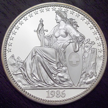 Swiss Helvetia in .999 silver and Gold - World Coins