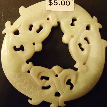 Jade? disk with Koi fish, 135 gms.  4 inches across from Cat thrift store
