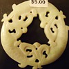 Jade? disk with Koi fish, 135 gms.  4 inches across from Cat thrift store
