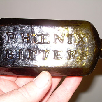 <-----A Sand Pontiled Bitters Bottle----->
