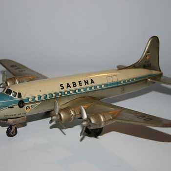 Arnold Douglas DC6 Sabena tin wind up toy airplane - Toys