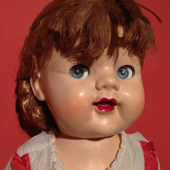 A lovely looking doll     made in England 