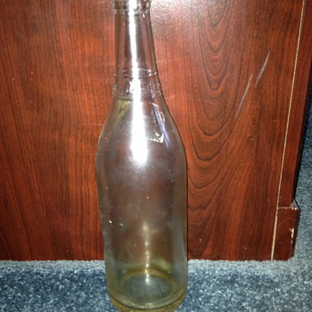 Cadillac oil bottle