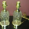 Does anyone know anything about these lamps? Crystal? Glass? Age? Value? 