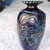 IRRIDESCENT TUBE LINED GLASS VASE  7" HIGH  X 4"  AT WIDEST PART OF VASE.