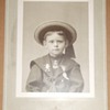 Patriotic boy with Spanish American War support badges