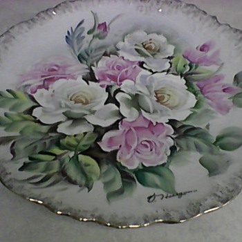 TWO UCAGCO HAND PAINTED PLATES