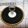 Vintage black round serving tray with gold trim