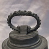 very old pewter stein has cross on one side 