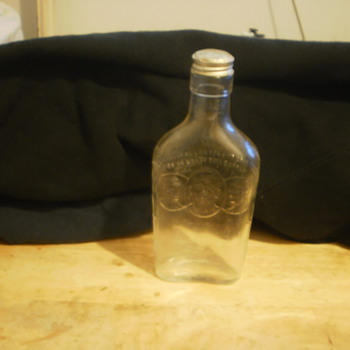 Old Harry Wilken and Sons Whiskey Bottle