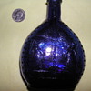 cobalt bottle found at flea market in Northern CA about 6 inches tall and embossed with OUR LADY OF GUADALUPE