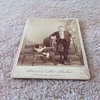 Cabinet card of boy with hunting rifle and dog c. 1885