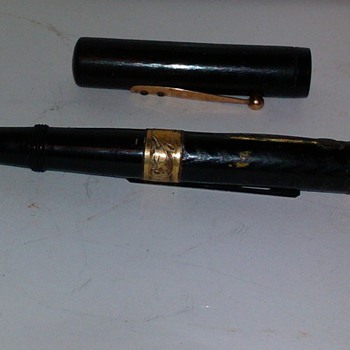 IN A CIGAR BOX OF PENS
