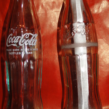 Old arabic embossed Coca-Cola bottle, from where ?