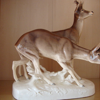 statue from deer couple