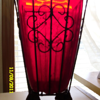 Red glass blown into cast iron wire vase-gargoyl footed - Art Glass