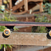 Very old skateboard made of laminated wood