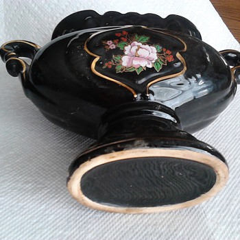 black pottery glass with gold trim and flower applied pink flower red berries 