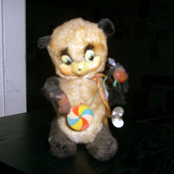 Tin wind-up pinwheel panda - Toys