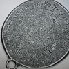 Hieroglyphics on a pendant????