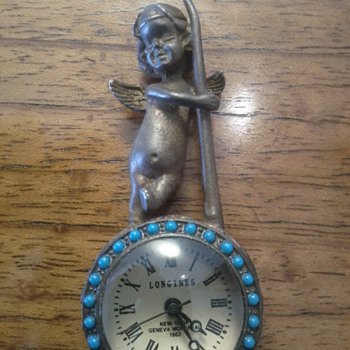 Help identify 1862 Longines clock?