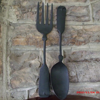 Large cast aluminum vintage spoon and fork wall hangers.