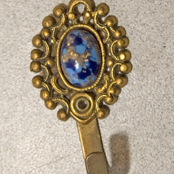 Vintage either plate hanger or cup hanger